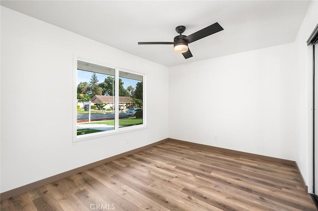 1563 Gary Ln, Redlands, CA 92374 - empty room featuring wood finished floors, ceiling fan, and baseboards