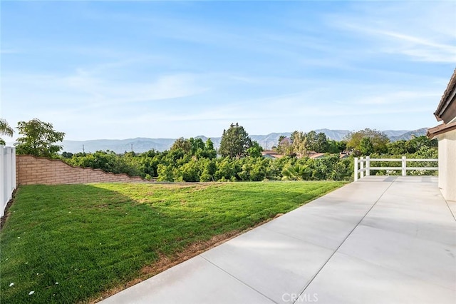 1563 Gary Ln, Redlands, CA 92374 - view of yard with a mountain view and a patio area