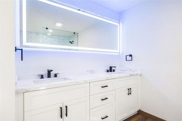 1563 Gary Ln, Redlands, CA 92374 - bathroom with a walk in shower, double vanity, and wood finished floors
