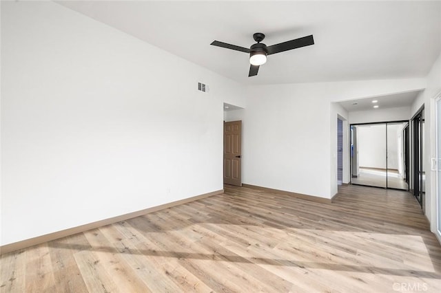 1563 Gary Ln, Redlands, CA 92374 - unfurnished room with light wood-style flooring, ceiling fan, and baseboards