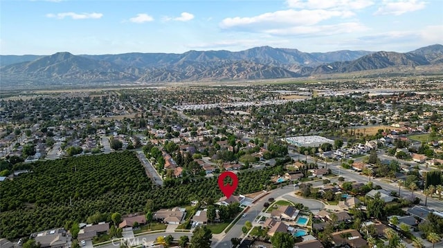 1563 Gary Ln, Redlands, CA 92374 - aerial view of property and surrounding area featuring mountains and nearby suburban area