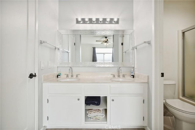 30902 Clubhouse Dr Unit 27D, Laguna Niguel, CA 92677 - bathroom featuring a shower with door, double vanity, and ceiling fan