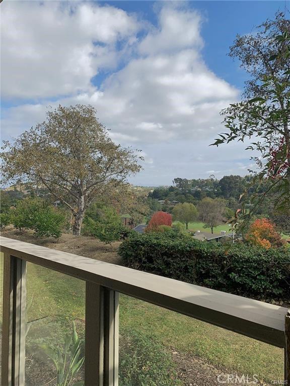 30902 Clubhouse Dr Unit 27D, Laguna Niguel, CA 92677 - view of yard with a balcony