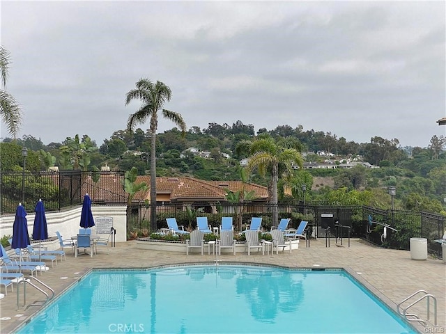 30902 Clubhouse Dr Unit 27D, Laguna Niguel, CA 92677 - community pool featuring a patio area and view of scattered trees