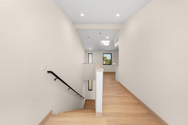 164 Cherry Ave, Carlsbad, CA 92008 - stairway featuring wood finished floors, a skylight, and recessed lighting