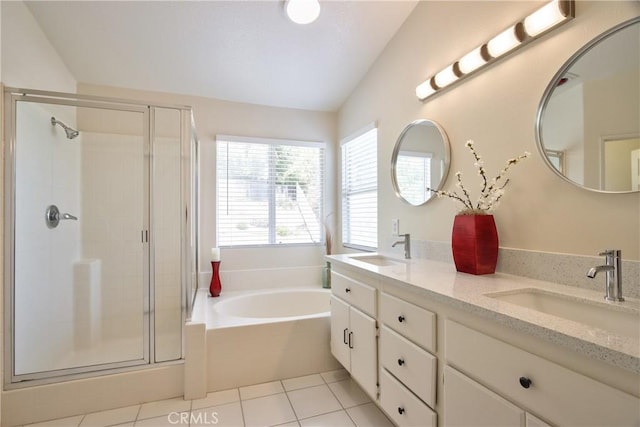 23794 Marin Ct, Murrieta, CA 92562 - full bathroom featuring a garden tub, a stall shower, double vanity, vaulted ceiling, and tile patterned flooring