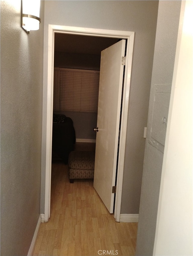 15412 La Mirada Blvd Unit 207, La Mirada, CA 90638 - hallway with light wood-style floors and baseboards