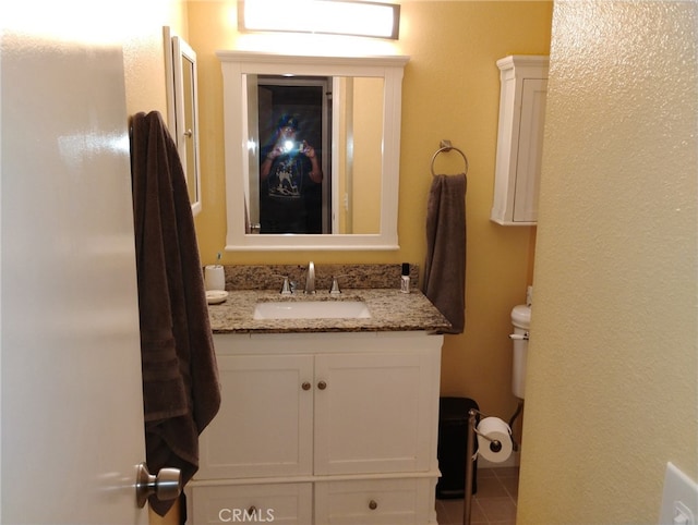 15412 La Mirada Blvd Unit 207, La Mirada, CA 90638 - bathroom featuring vanity, toilet, and tile patterned floors