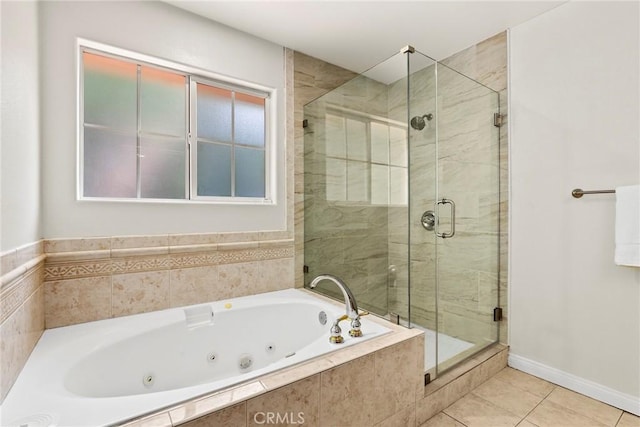 609 E Newmark Ave, Monterey Park, CA 91755 - bathroom with a tub with jets, a shower stall, and tile patterned floors
