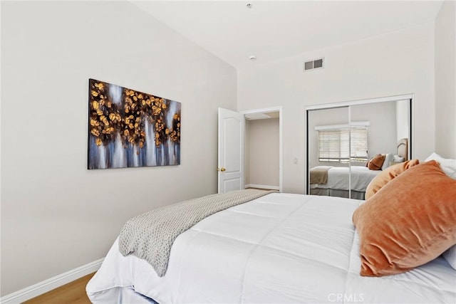 609 E Newmark Ave, Monterey Park, CA 91755 - bedroom featuring a closet and wood finished floors