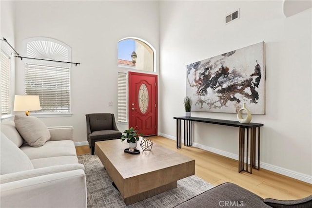 609 E Newmark Ave, Monterey Park, CA 91755 - living room featuring wood finished floors and a towering ceiling