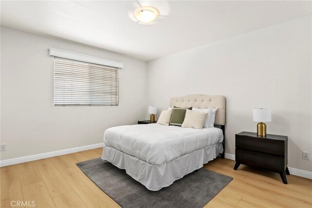 609 E Newmark Ave, Monterey Park, CA 91755 - bedroom featuring light wood finished floors