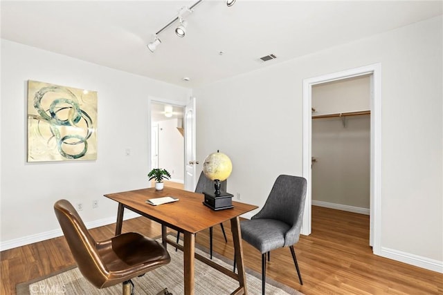 609 E Newmark Ave, Monterey Park, CA 91755 - office featuring track lighting and wood finished floors