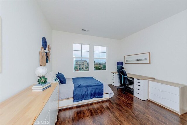 10410 Orchid Way, Santa Fe Springs, CA 90670 - bedroom with wood finished floors and a desk
