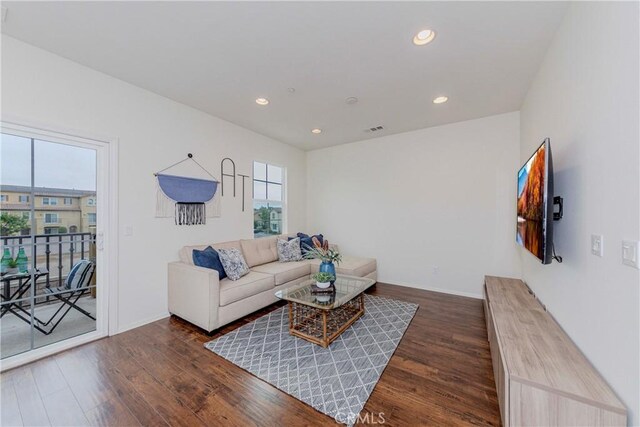 10410 Orchid Way, Santa Fe Springs, CA 90670 - living room featuring wood finished floors and recessed lighting