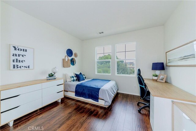 10410 Orchid Way, Santa Fe Springs, CA 90670 - bedroom with dark wood finished floors and a desk
