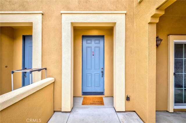 10410 Orchid Way, Santa Fe Springs, CA 90670 - entrance to property with stucco siding