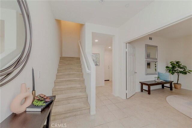 10410 Orchid Way, Santa Fe Springs, CA 90670 - staircase featuring tile patterned flooring and recessed lighting