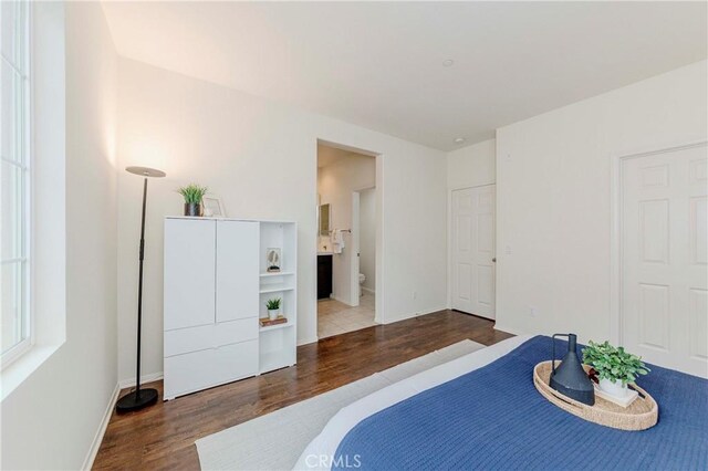 10410 Orchid Way, Santa Fe Springs, CA 90670 - bedroom featuring wood finished floors and ensuite bathroom