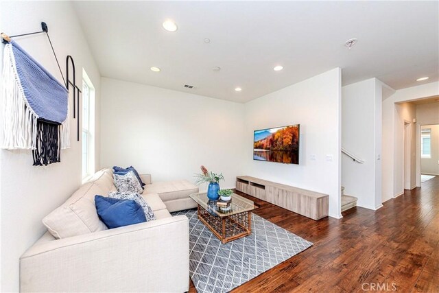 10410 Orchid Way, Santa Fe Springs, CA 90670 - living area with wood finished floors, recessed lighting, and stairway
