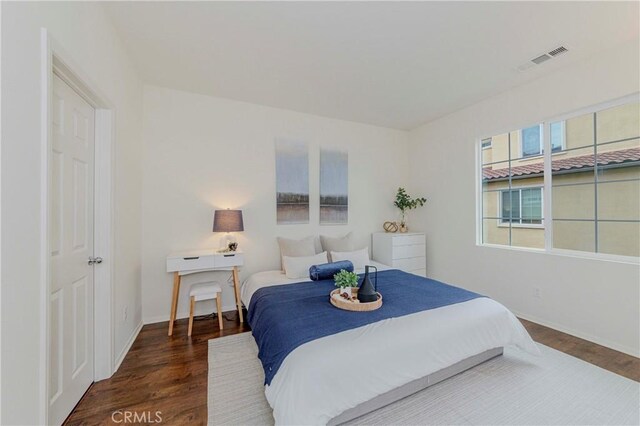 10410 Orchid Way, Santa Fe Springs, CA 90670 - bedroom with wood finished floors