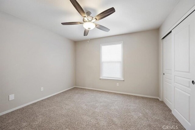 11506 Cuervo Way, Atascadero, CA 93422 - unfurnished bedroom featuring carpet floors, a closet, baseboards, and ceiling fan