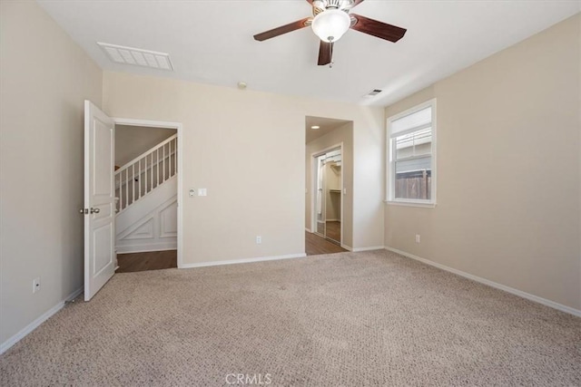 11506 Cuervo Way, Atascadero, CA 93422 - unfurnished bedroom featuring carpet flooring, baseboards, a walk in closet, and ceiling fan