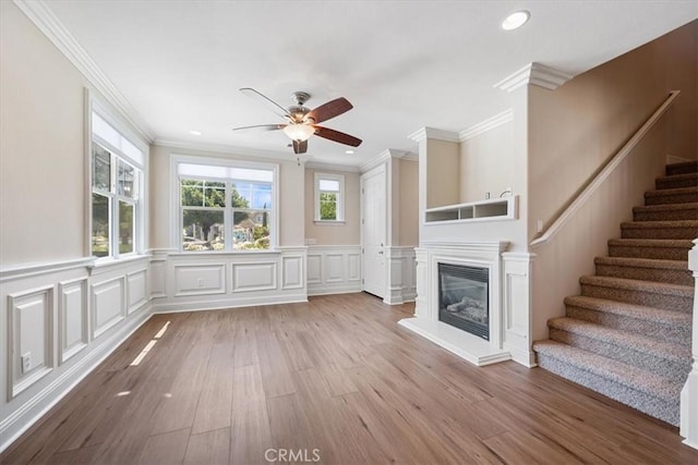 11506 Cuervo Way, Atascadero, CA 93422 - unfurnished living room with wood finished floors, ornamental molding, stairway, ceiling fan, and recessed lighting