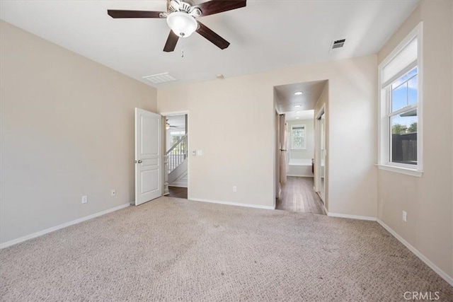 11506 Cuervo Way, Atascadero, CA 93422 - unfurnished bedroom with carpet floors and multiple windows
