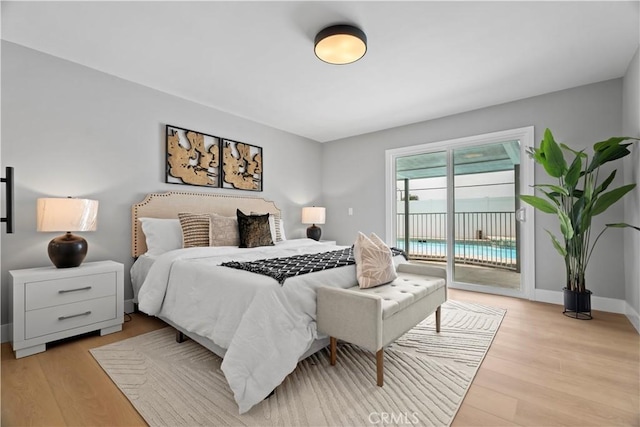 2014 Cumberland Rd, Glendora, CA 91741 - bedroom with access to exterior, light wood-style floors, and baseboards