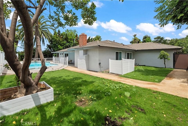 2014 Cumberland Rd, Glendora, CA 91741 - rear view of house featuring a chimney and stucco siding