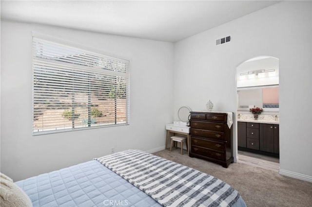 1324 Soundview Cir, Corona, CA 92881 - bedroom featuring light carpet, baseboards, and ensuite bath