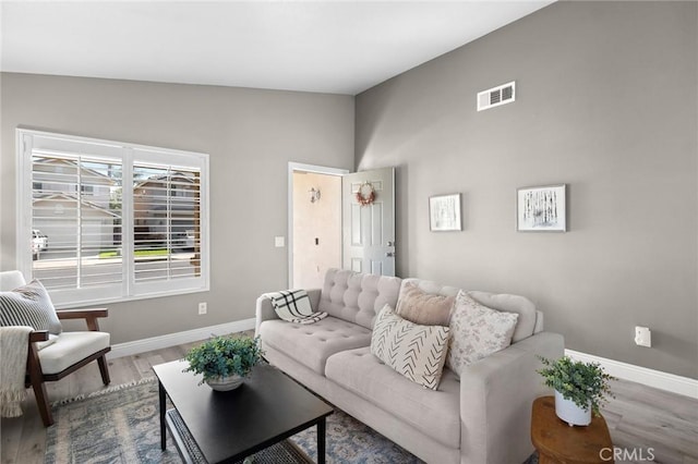 1324 Soundview Cir, Corona, CA 92881 - living room featuring baseboards, wood finished floors, and lofted ceiling