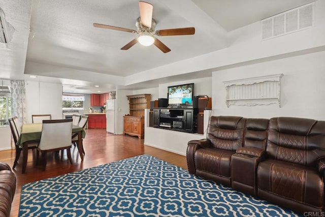 1529 Cloverdale Rd, Escondido, CA 92027 - living room with dark wood-style flooring and a ceiling fan