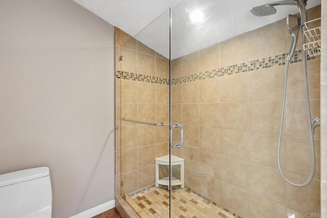 1529 Cloverdale Rd, Escondido, CA 92027 - bathroom with a stall shower, toilet, and baseboards