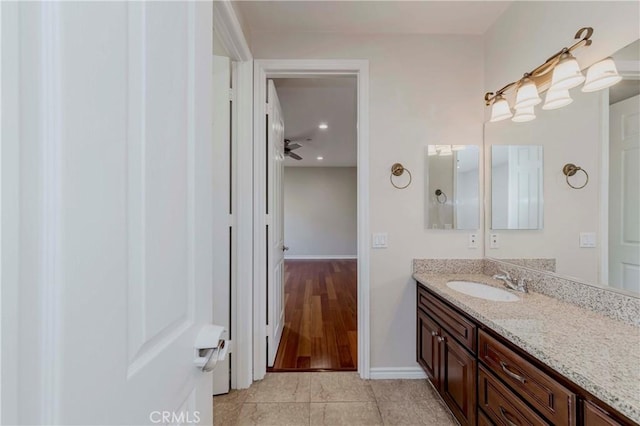 211 Franklin Ave, Redlands, CA 92373 - bathroom featuring vanity, baseboards, and tile patterned flooring