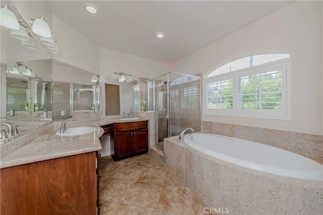 211 Franklin Ave, Redlands, CA 92373 - bathroom with a stall shower, two vanities, a bath, tile patterned flooring, and recessed lighting