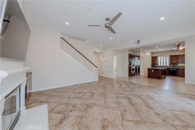 211 Franklin Ave, Redlands, CA 92373 - unfurnished living room featuring stairs, a ceiling fan, recessed lighting, light tile patterned floors, and baseboards