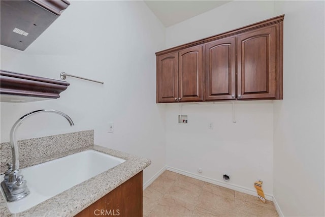 211 Franklin Ave, Redlands, CA 92373 - laundry area featuring cabinet space, baseboards, and hookup for a washing machine