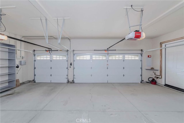 211 Franklin Ave, Redlands, CA 92373 - garage featuring a garage door opener