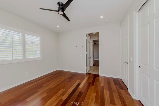 211 Franklin Ave, Redlands, CA 92373 - unfurnished bedroom with wood finished floors, a closet, baseboards, recessed lighting, and a ceiling fan
