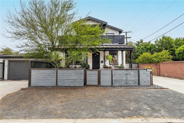 6557 Clybourn Ave, North Hollywood, CA 91606 - view of front of home with a fenced front yard and stucco siding