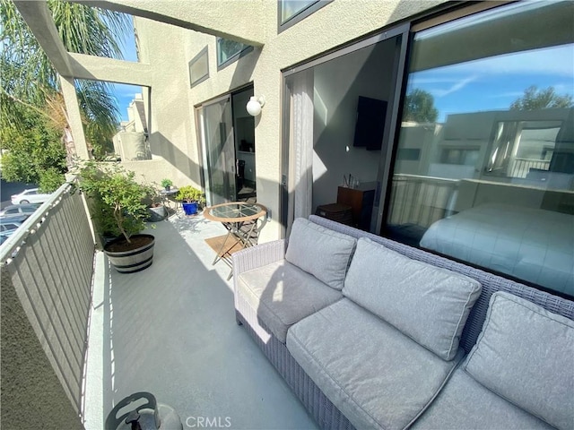 17722 Sergio Cir Unit 203, Huntington Beach, CA 92647 - balcony featuring an outdoor hangout area