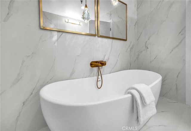 200 S Catalina Ave Unit 403, Redondo Beach, CA 90277 - bathroom with marble finish floors, a soaking tub, and tile walls