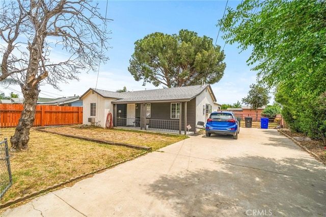 15017 Hibiscus Ave, Fontana, CA 92335 - ranch-style home featuring concrete driveway, a porch, and stucco siding