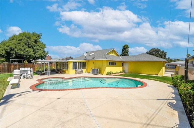1426 E Colver Pl, Covina, CA 91724 - view of swimming pool with a patio area, central AC unit, and a pool with connected hot tub