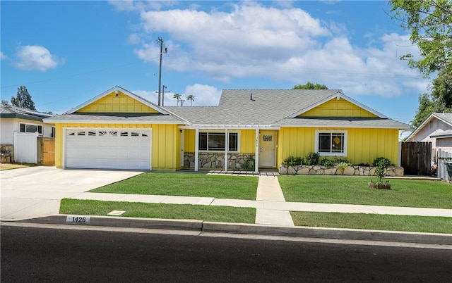 1426 E Colver Pl, Covina, CA 91724 - single story home featuring a garage, concrete driveway, board and batten siding, and a shingled roof