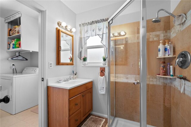 1426 E Colver Pl, Covina, CA 91724 - bathroom featuring washer / clothes dryer, a shower stall, vanity, and tile patterned floors
