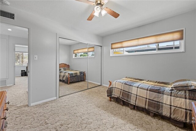 1426 E Colver Pl, Covina, CA 91724 - bedroom with carpet floors, multiple windows, baseboards, and a closet