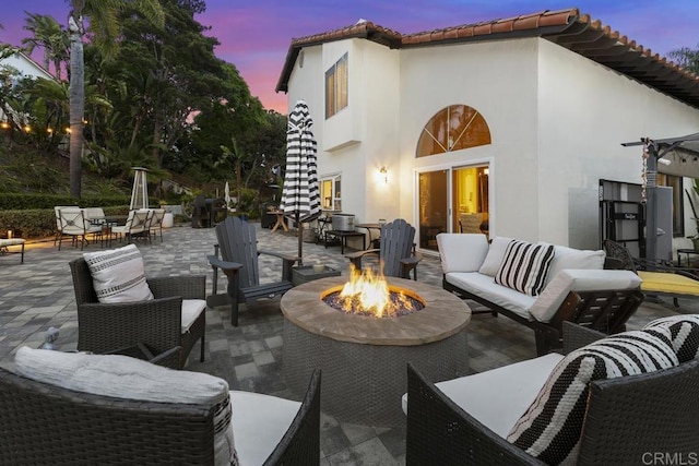 4520 Tarantella Ln, San Diego, CA 92130 - view of patio / terrace with an outdoor living space with a fire pit